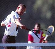 Photo of girl writing on notebook