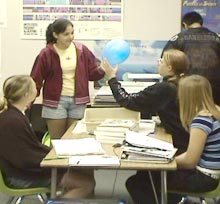 Photo of girl writing on notebook